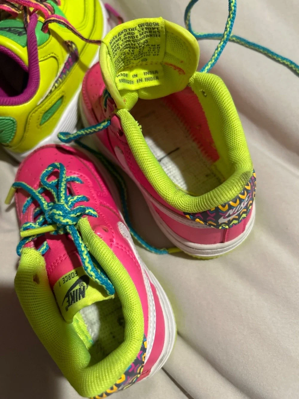 Two pairs of Nike toddler size 6c sneakers